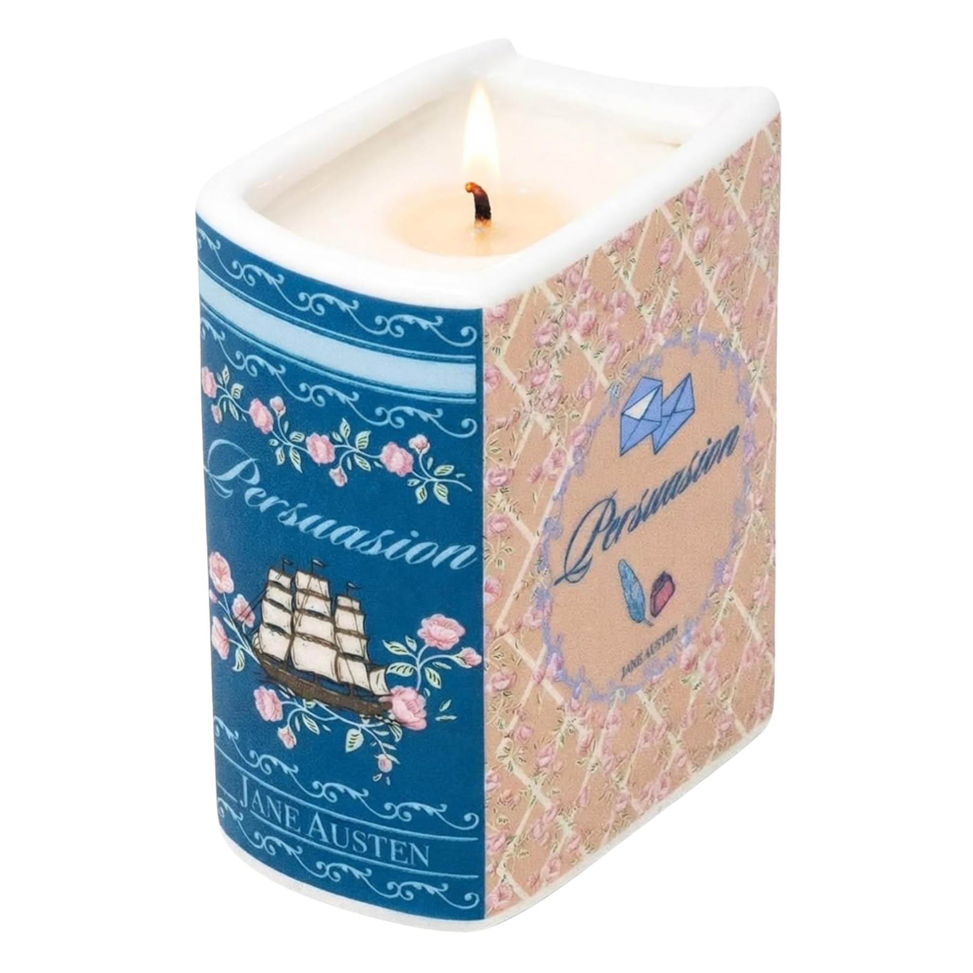 A square-shaped lit candle with a white top and a decorative printed body. One side is blue with pink flowers, a sailing ship illustration, and the word 'Persuasion' by Jane Austen.