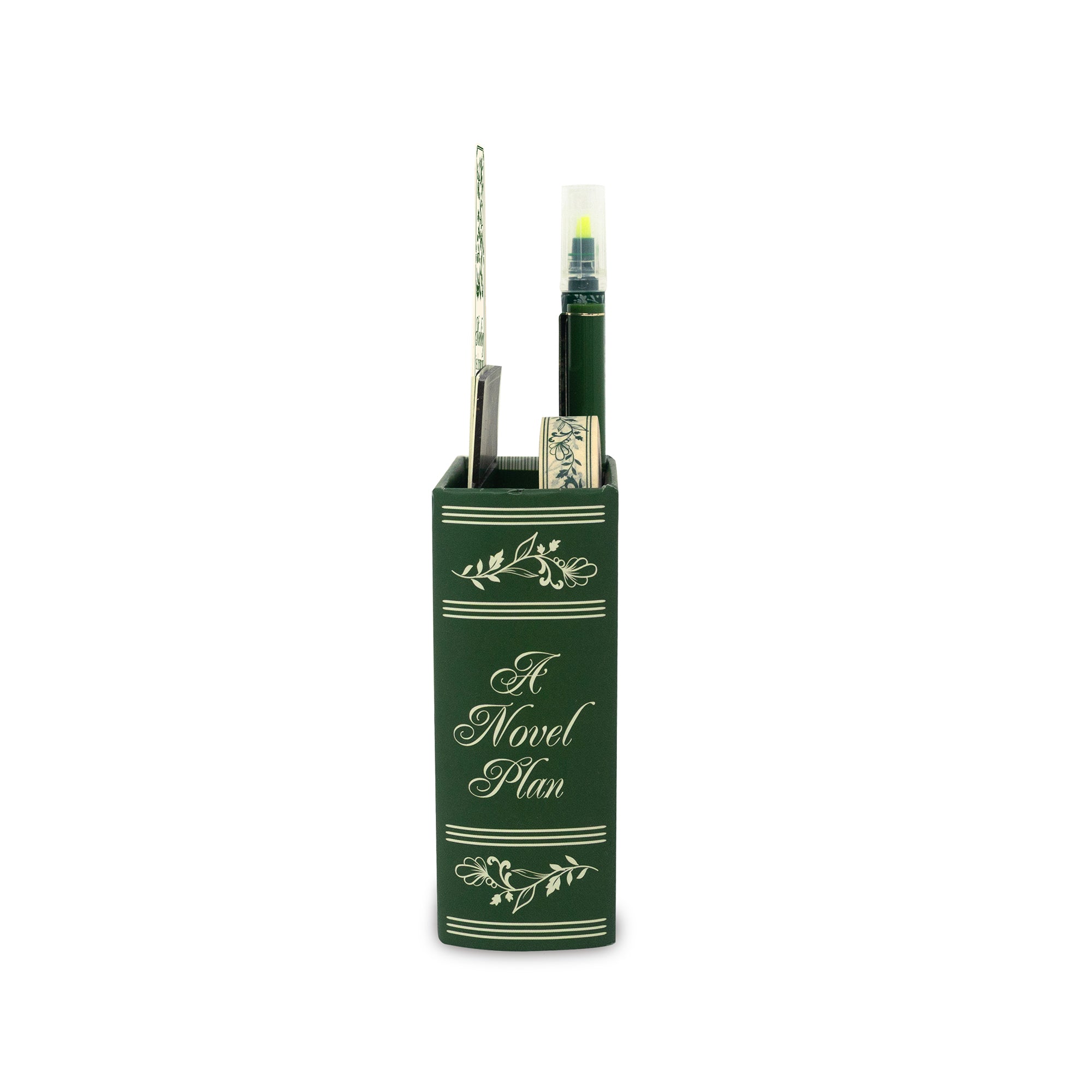 Green book-shaped pen holder with a pen on a white background