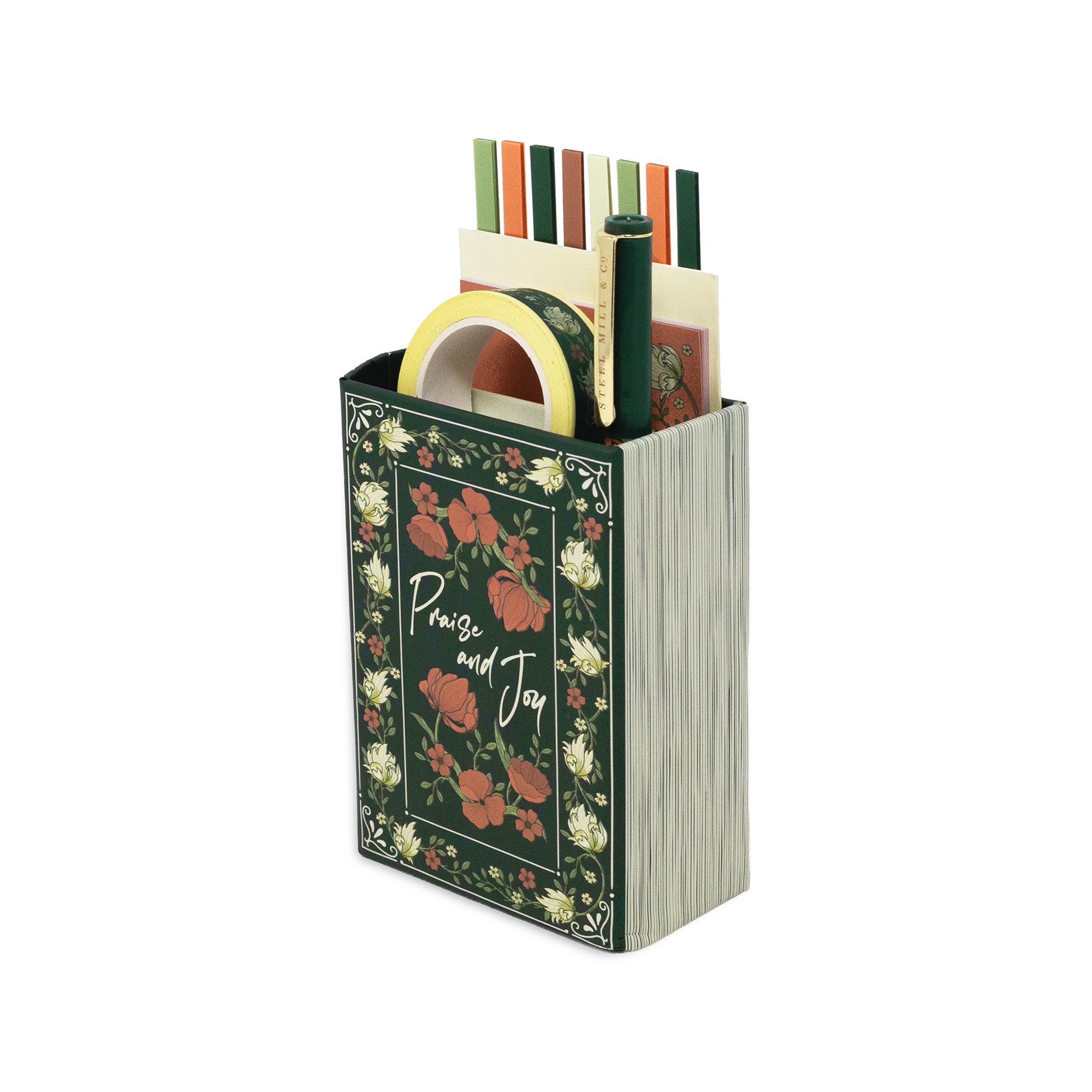A decorative organizer with a dark green floral pattern and the words 'Praise and Joy' on the front, shown filled with pens, tape, and paper strips on a white background.