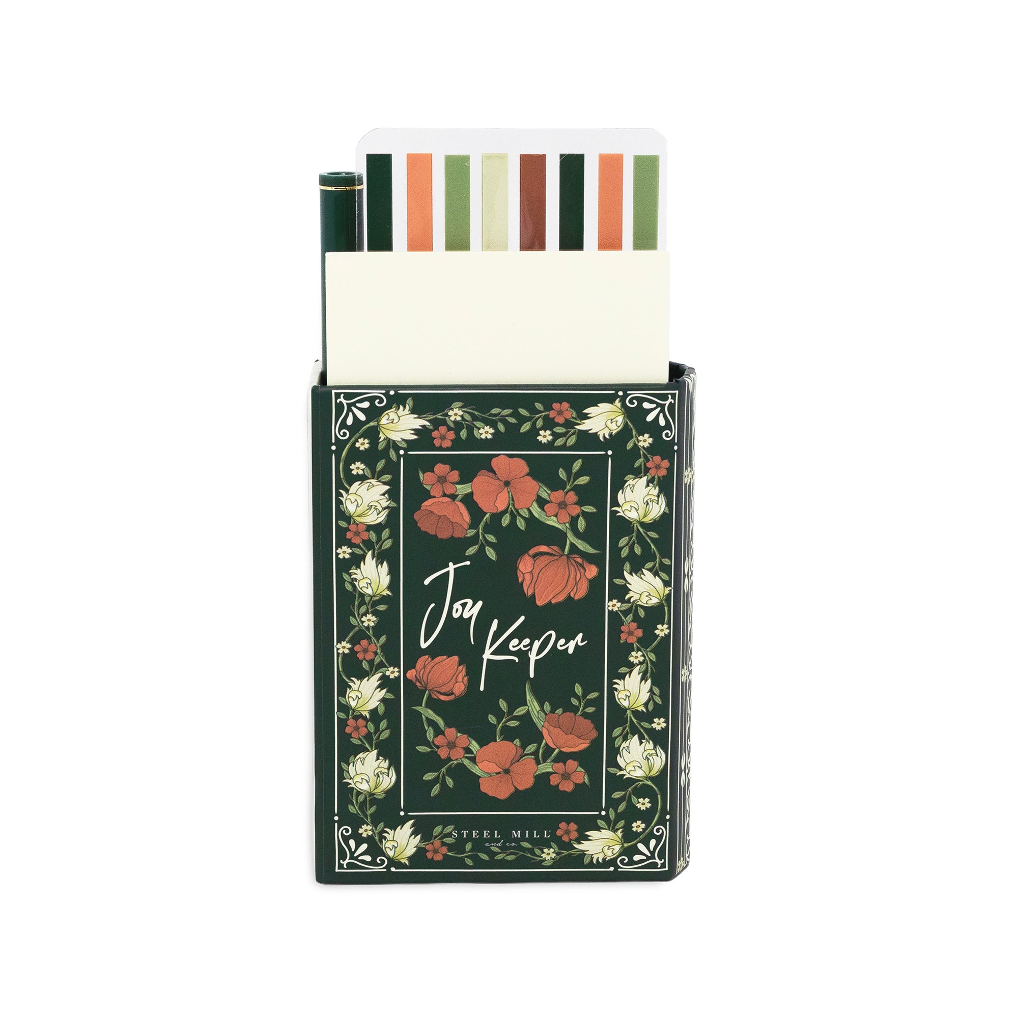 A boxed set of journaling or note cards labeled 'Joy Keeper' with a dark green floral box and a row of colored tabs visible at the top, photographed on a plain white background.