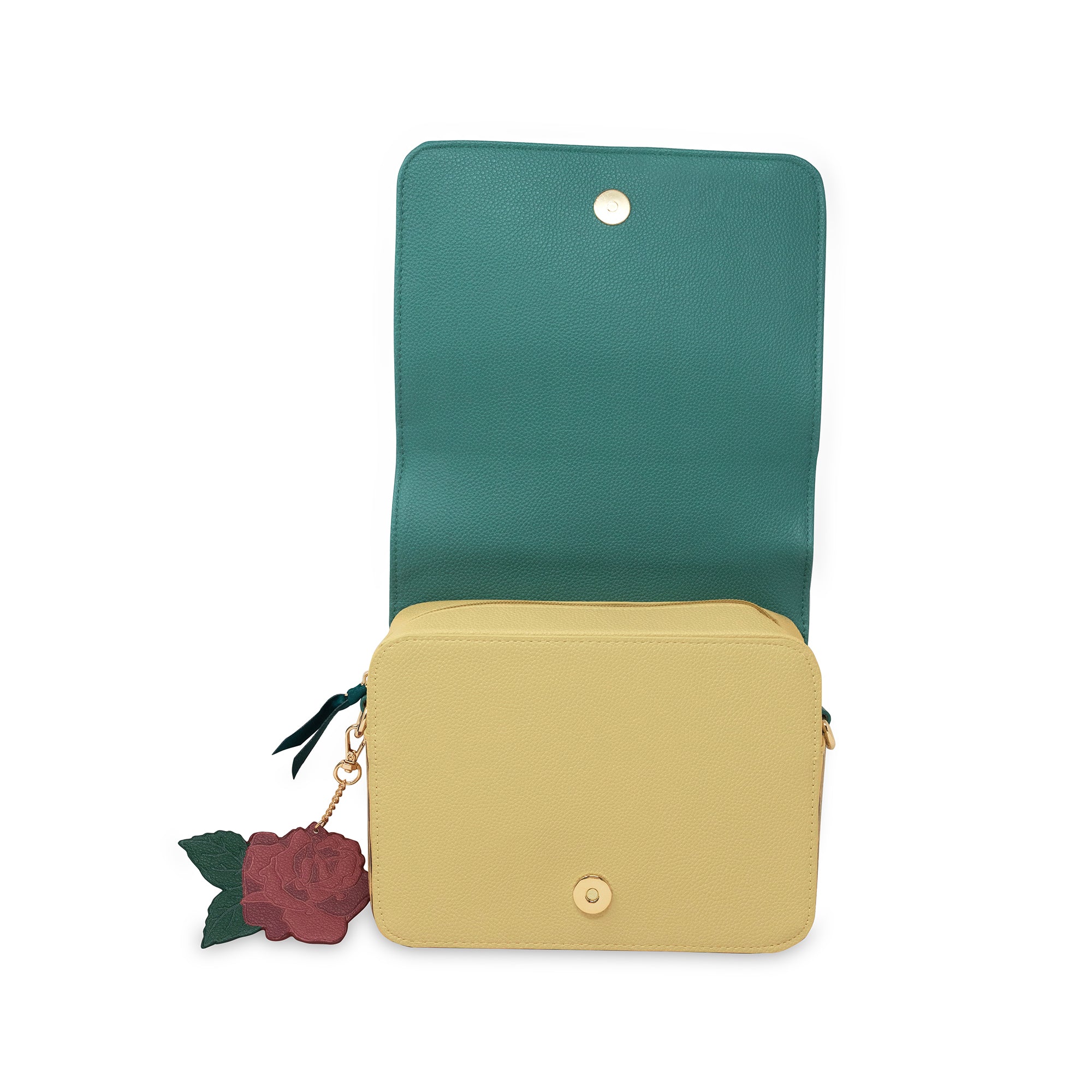 yellow inside of teal beauty and the beast book shaped crossbody bag