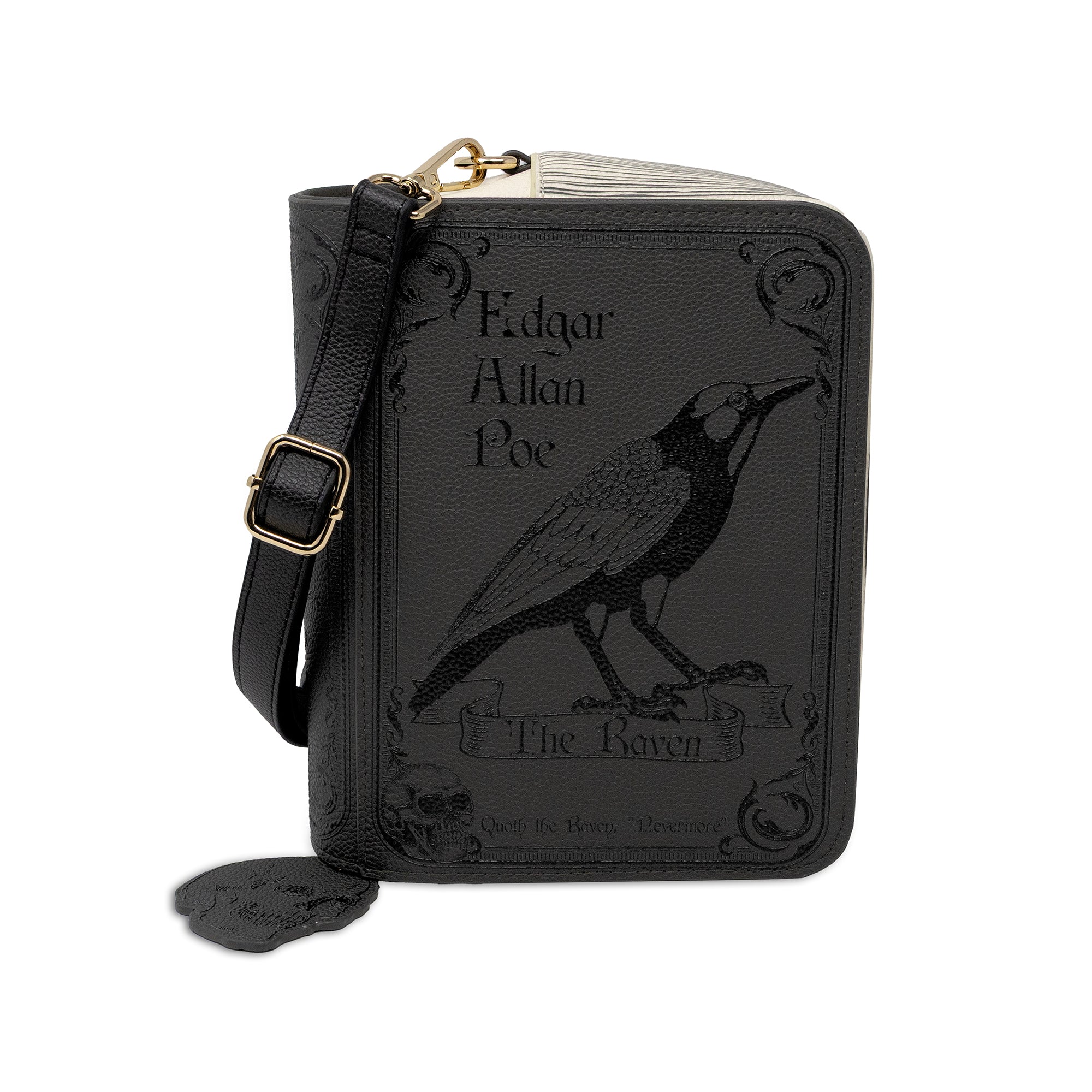 A black faux-leather crossbody styled like a book cover for 'The Raven' by Edgar Allan Poe, featuring an embossed raven illustration and gold-tone hardware, shown on a white background.