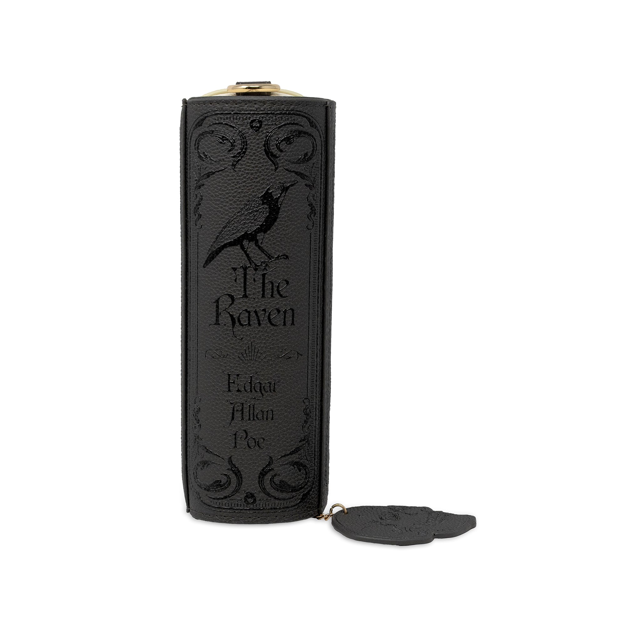 A black lcrossbody with embossed gothic-style raven artwork and the words 'The Raven' and 'Edgar Allan Poe' on the front, shown upright on a white background with a small matching tag attached.