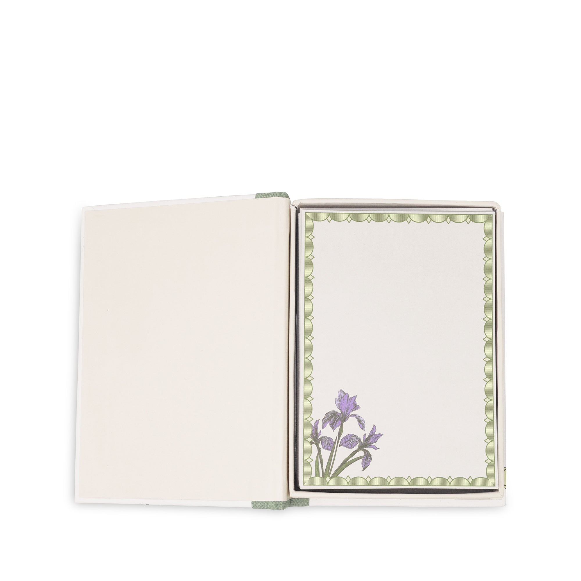 Open notepad with a floral design on a white background