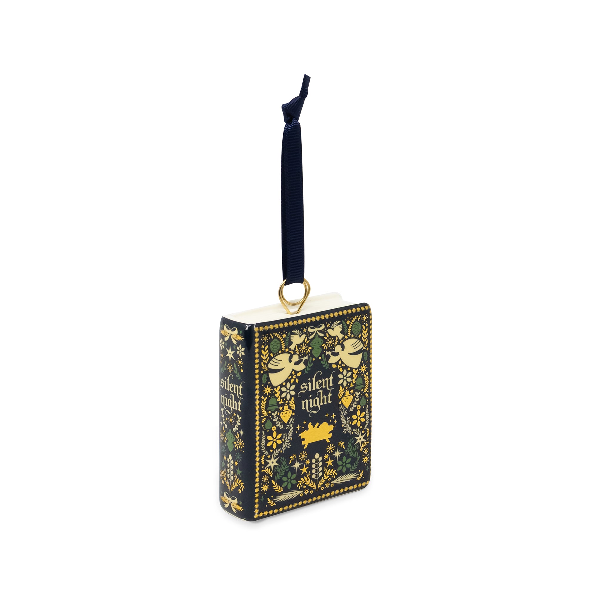 A decorative book-shaped ornament featuring the title 'A Silent Night' in gold lettering, decorated with a dark navy blue and gold pattern of birds, stars, and musical notes. It has a hanging loop at the top and is shown on a plain white background.
