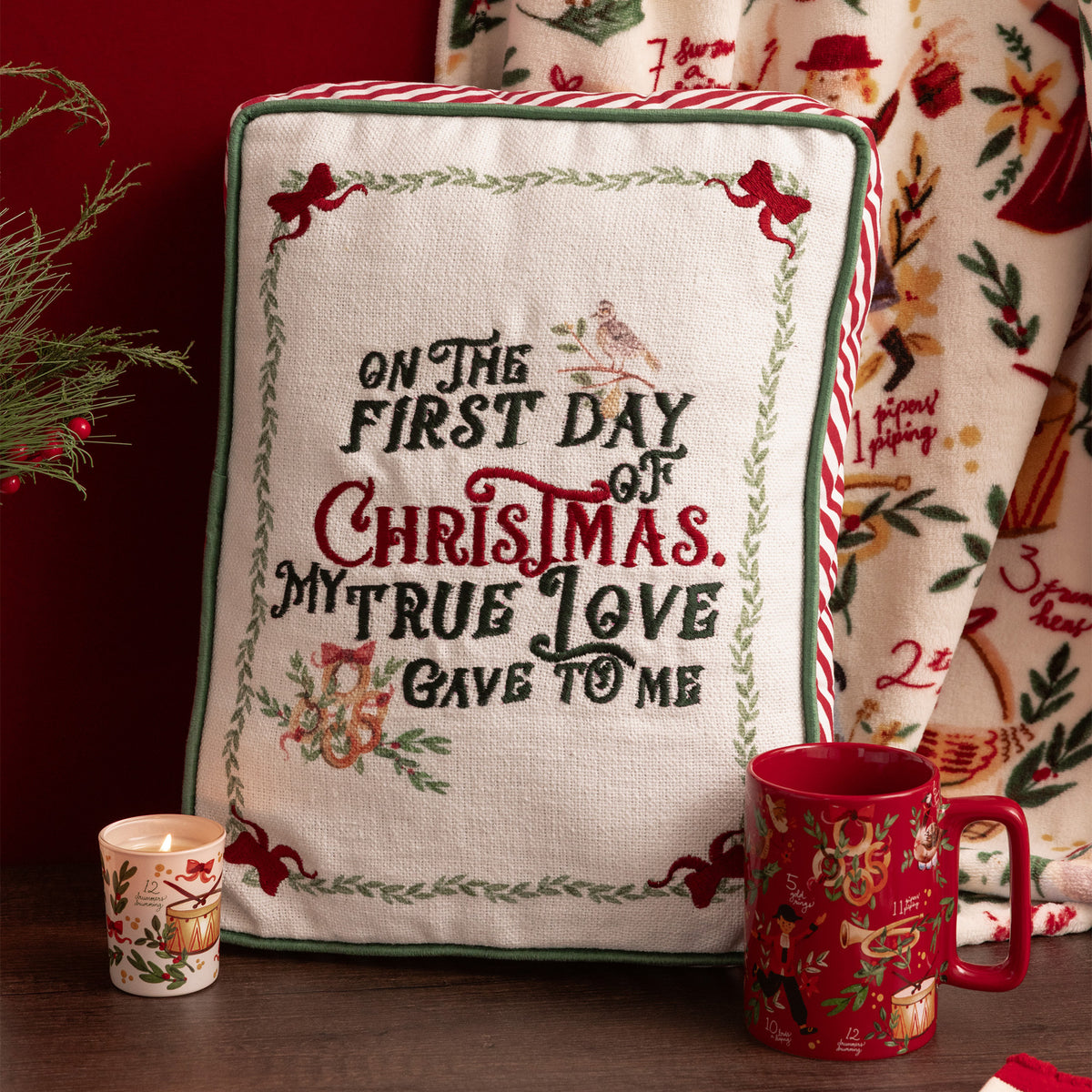 embroidered 'on the first day of christmas my true love gave to me' with green piping detail