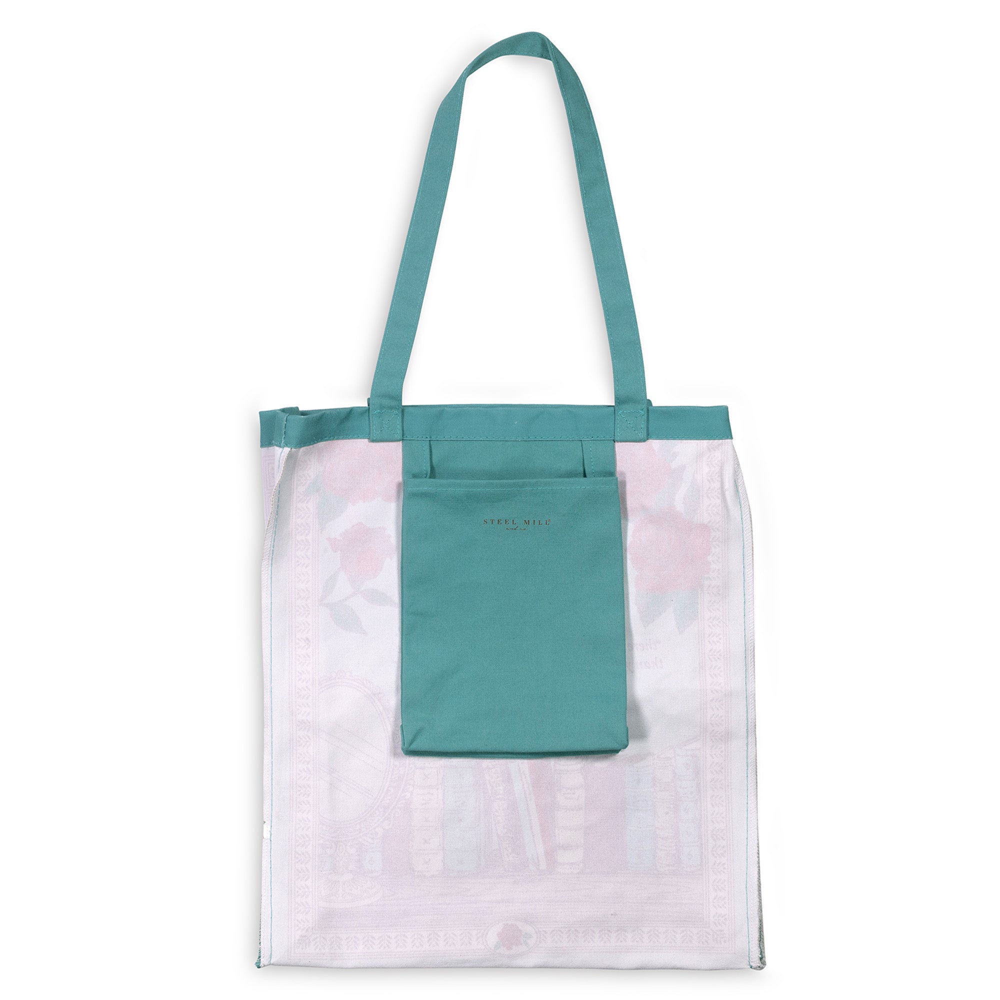 Tote bag with a green top section and pink floral pattern on the bottom half against a white background