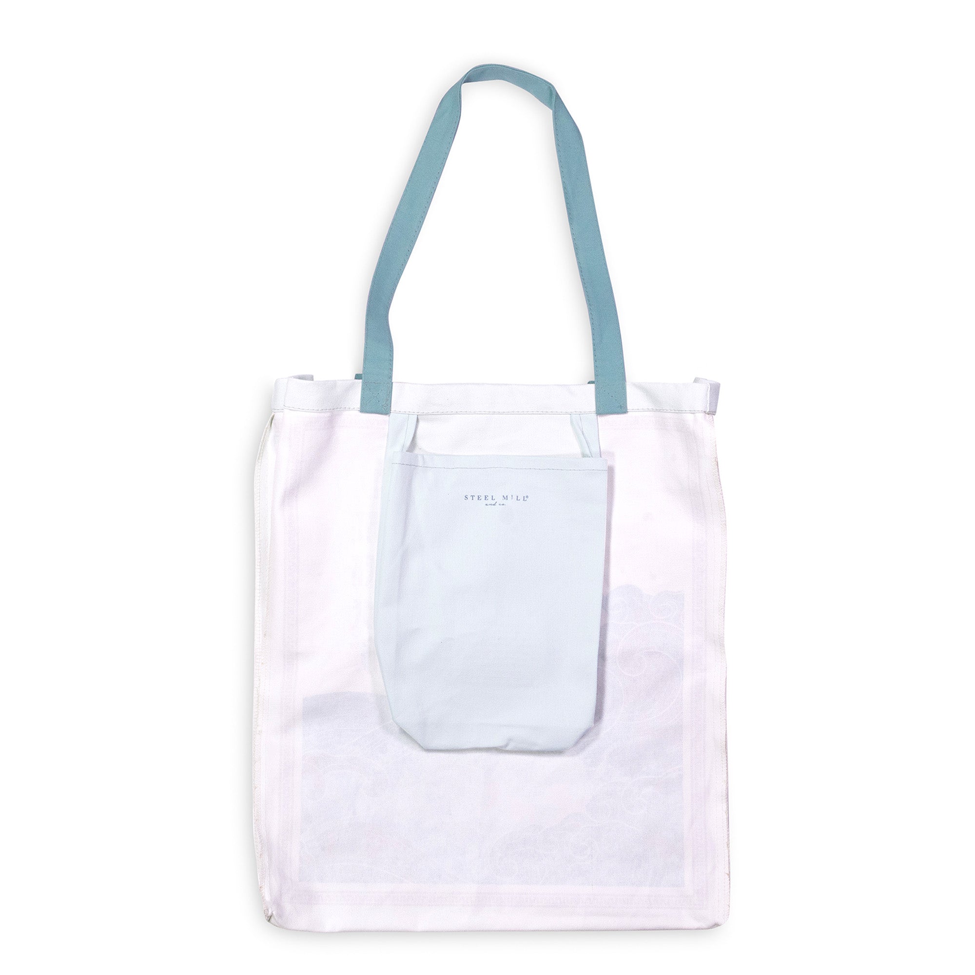 interior pocket of light blue the odyssey book tote bag with graphic