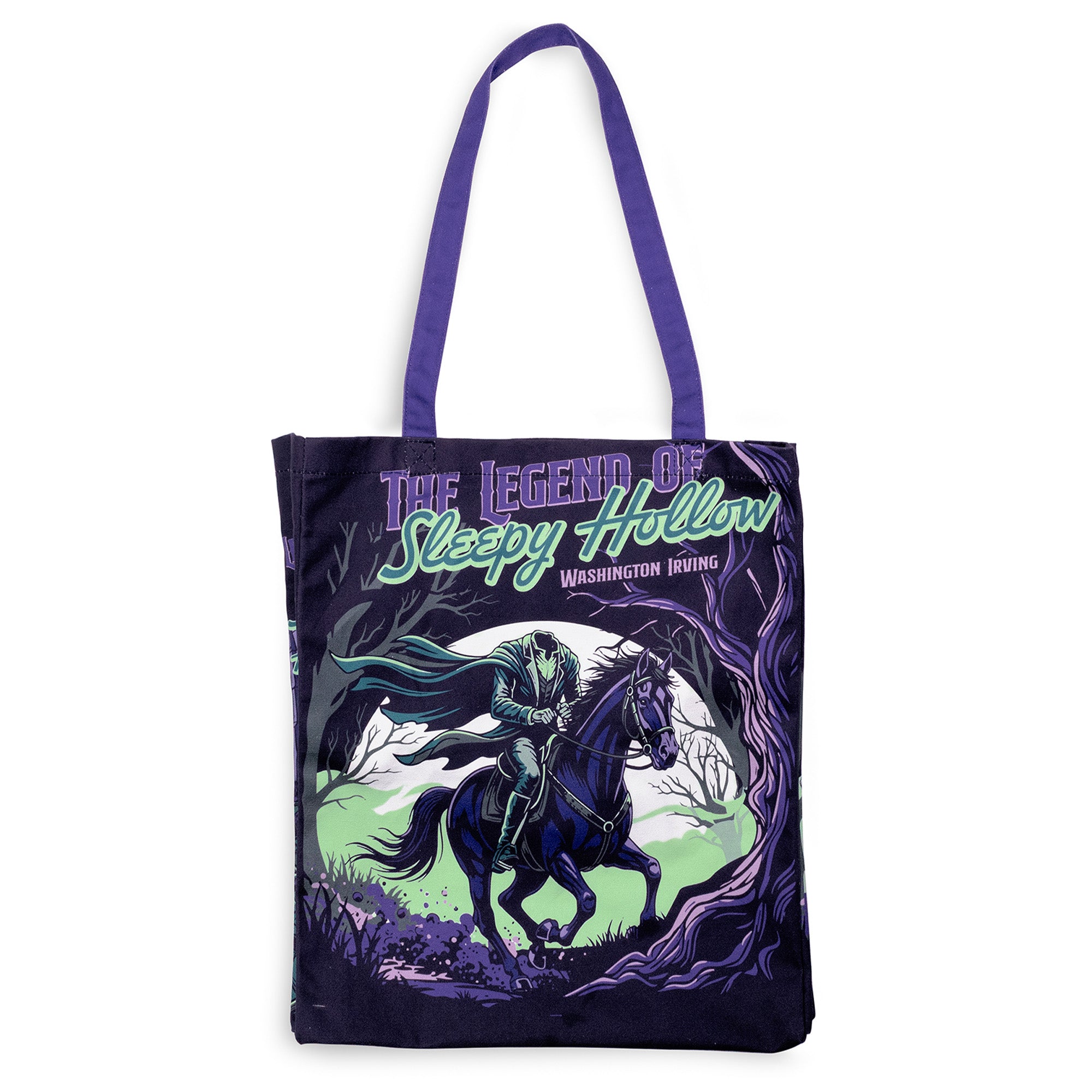A dark tote bag with purple handles and a graphic print of a ghostly rider on a horse in a spooky forest, featuring the text 'The Legend of Sleepy Hollow' and 'Washington Irving'.