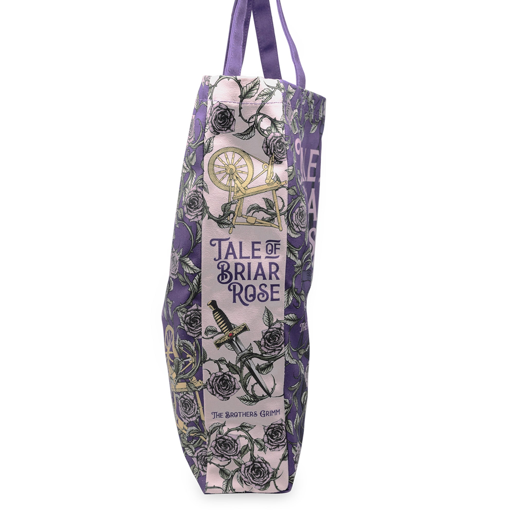 side view of Tote bag with floral design and 'Tale of Briar Rose' text on a white background