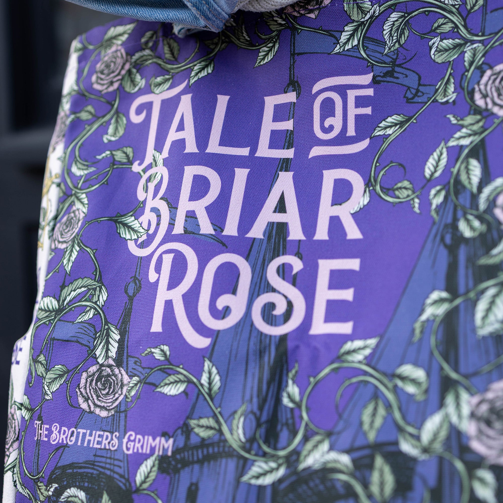 Purple book cover with 'Tale of Briar Rose' and floral designs