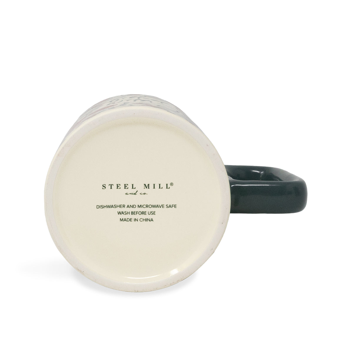 A ceramic mug shown from its bottom side, featuring a glossy off-white interior with the 'STEEL MILL and co' brand name printed in black, and a dark green handle on the right against a white background.
