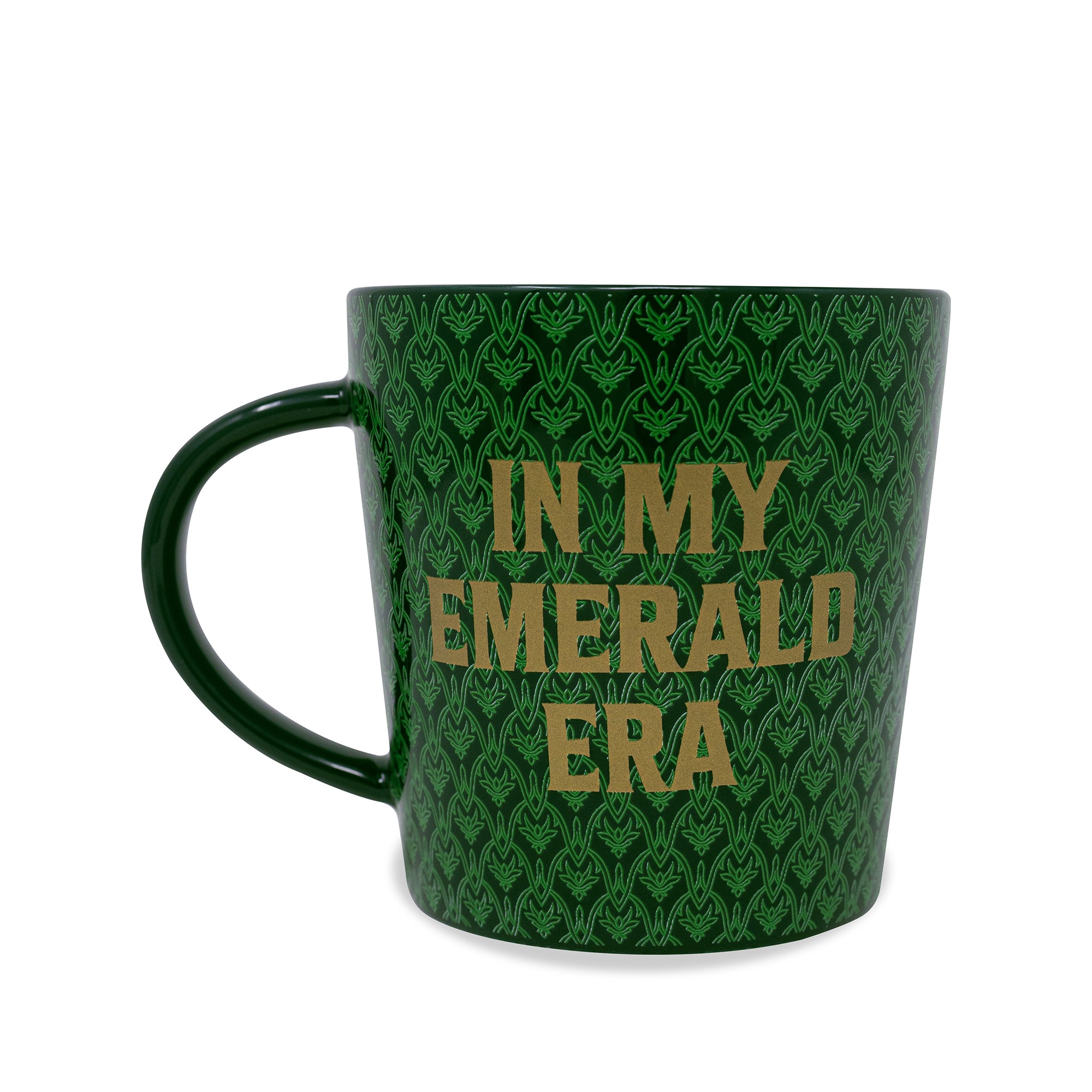 Green mug with 'In My Emerald Era' text on a white background
