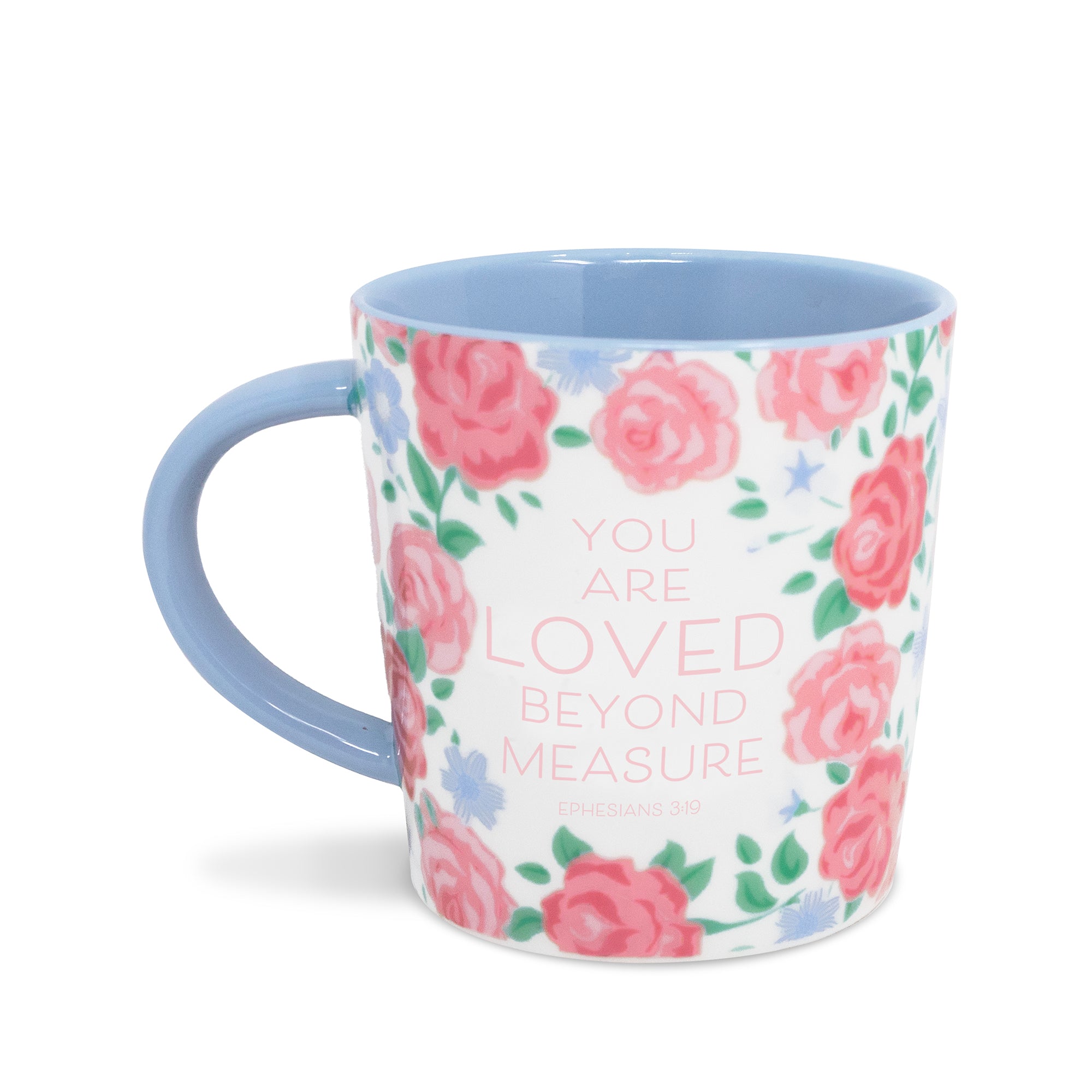 Mug with floral design and text 'You are loved beyond measure' on a white background