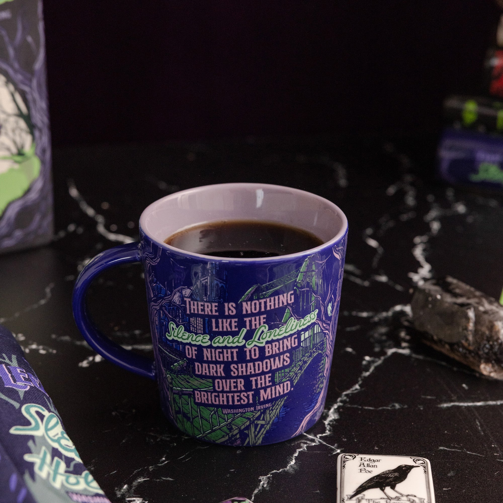 Blue mug with quote that says 'There is nothing like silence and loneliness of the night to ring dark shadows over the brightest mind'