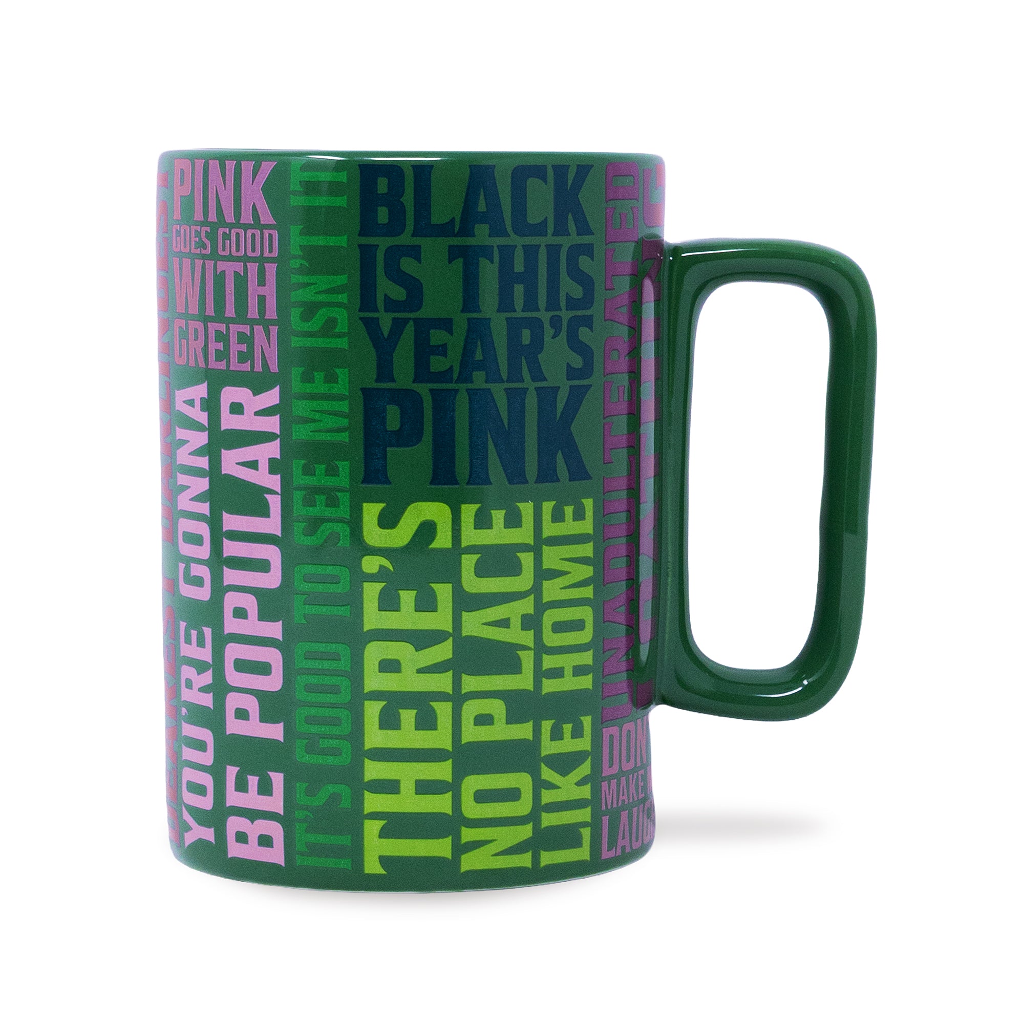 A dark green ceramic mug featuring a colorful text collage with motivational and social justice quotes in pink, purple, and light green, set against a plain white background.