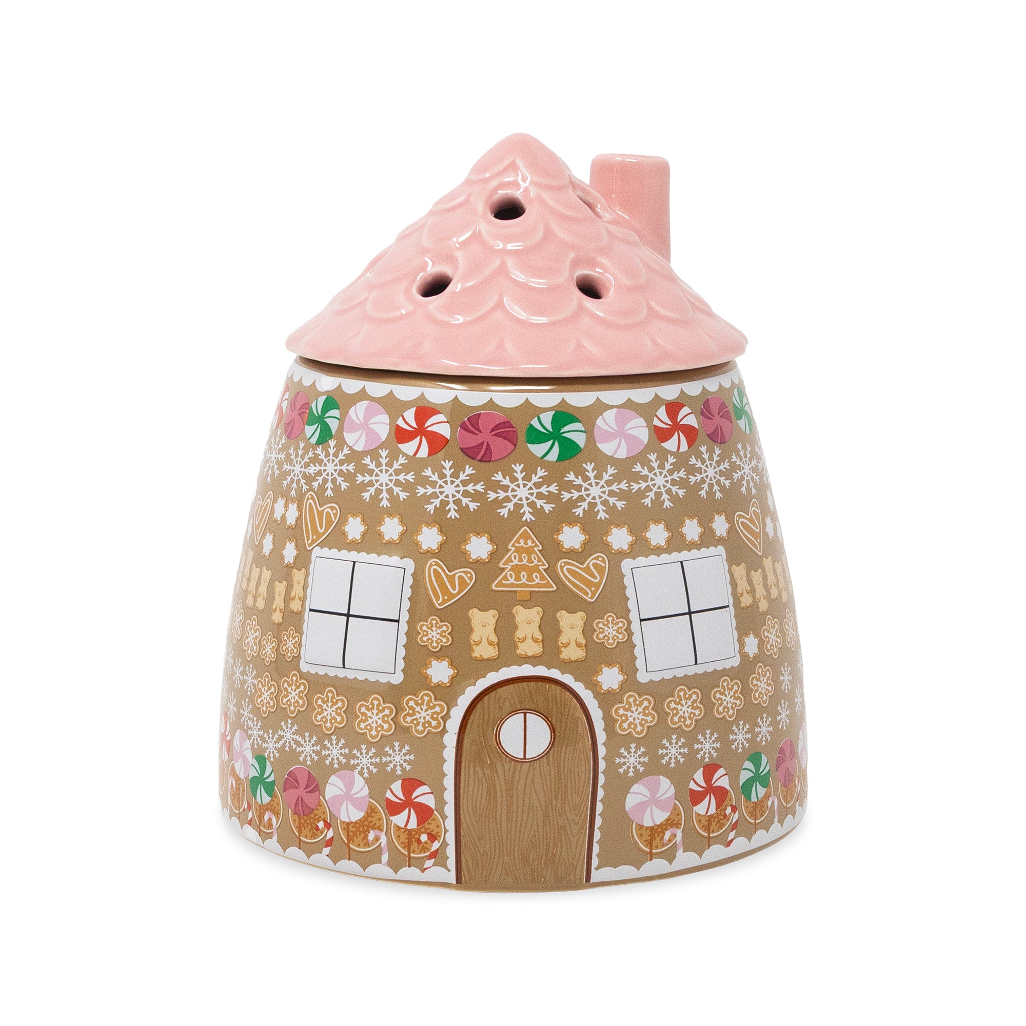 A ceramic gingerbread house-shaped vase with a pink roof, decorated with white snowflakes, colorful candy canes, and gingerbread cookie motifs on a light brown body, shown on a plain white background.