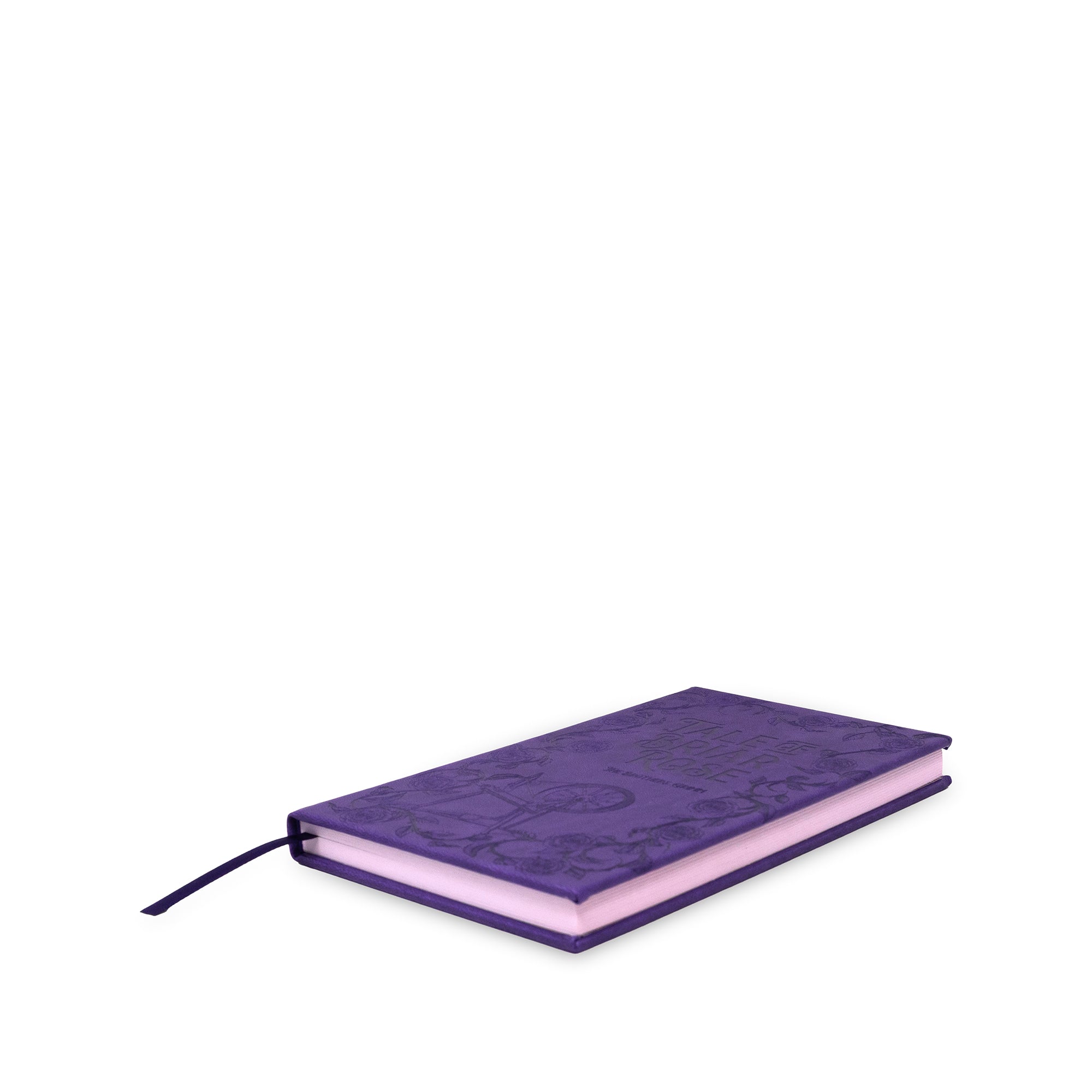 Purple notebook with a floral pattern on a white background