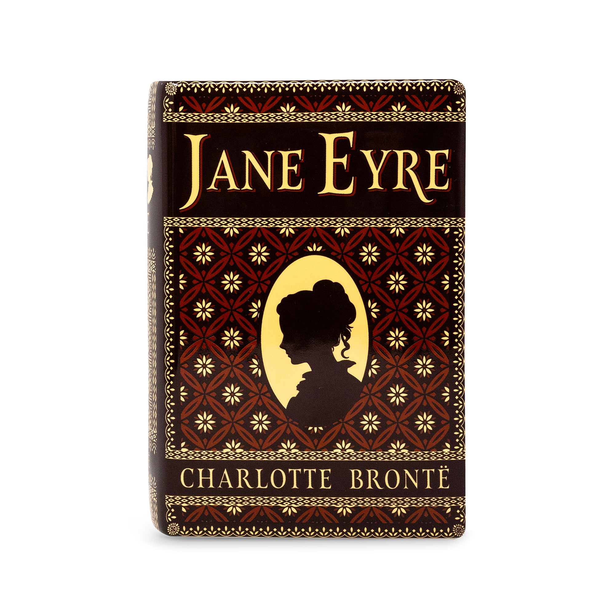 A decorative Jane Eyre book cover or book-shaped vase shown upright on a plain white background. The cover is dark brown with gold lettering reading 'JANE EYRE' and 'CHARLOTTE BRONTÈ', plus a gold silhouette portrait and repeating floral geometric pattern.