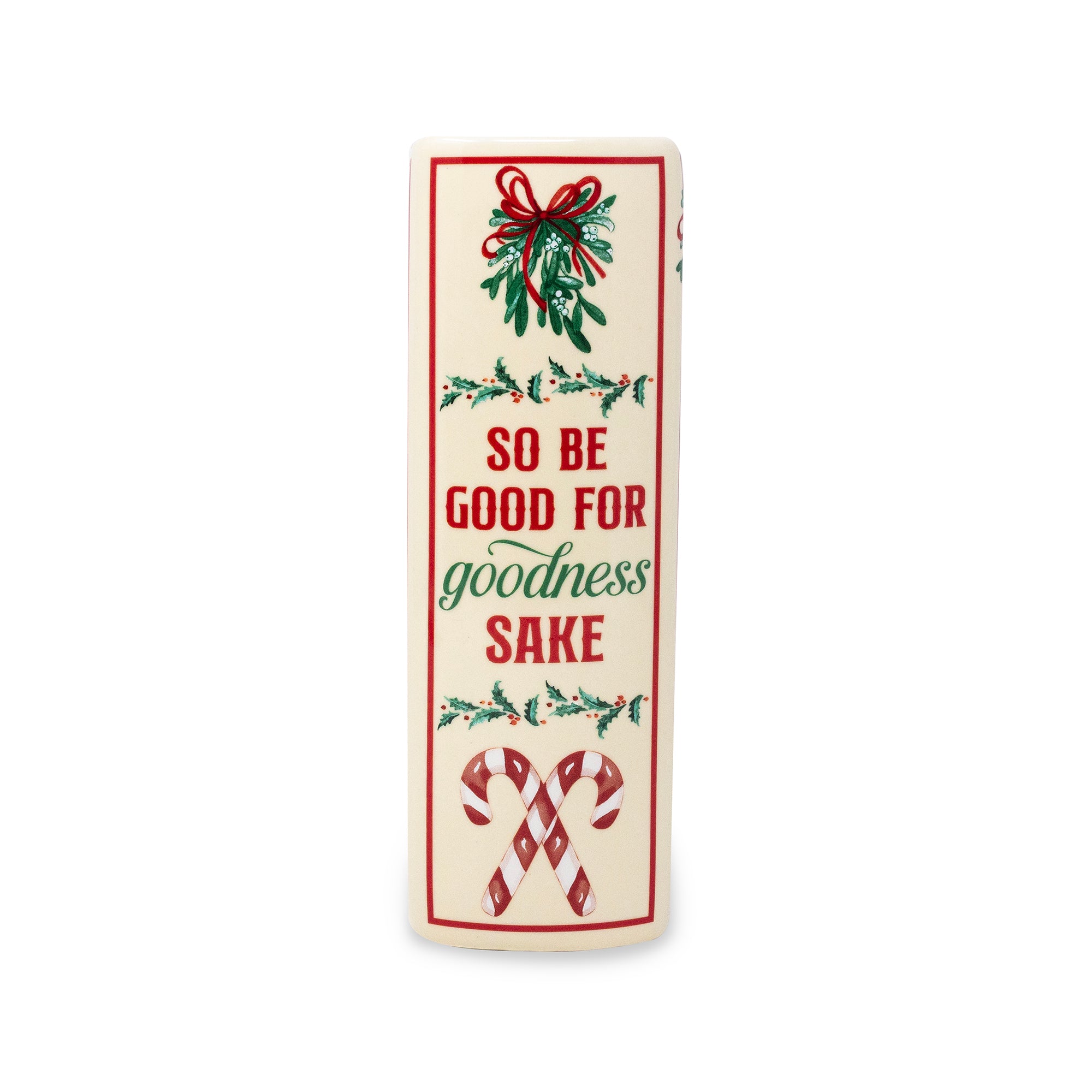 vase spine that says red and green text reading 'SO BE GOOD FOR goodness SAKE' surrounded by holly leaves, a red bow, and candy canes, set against a plain white background.