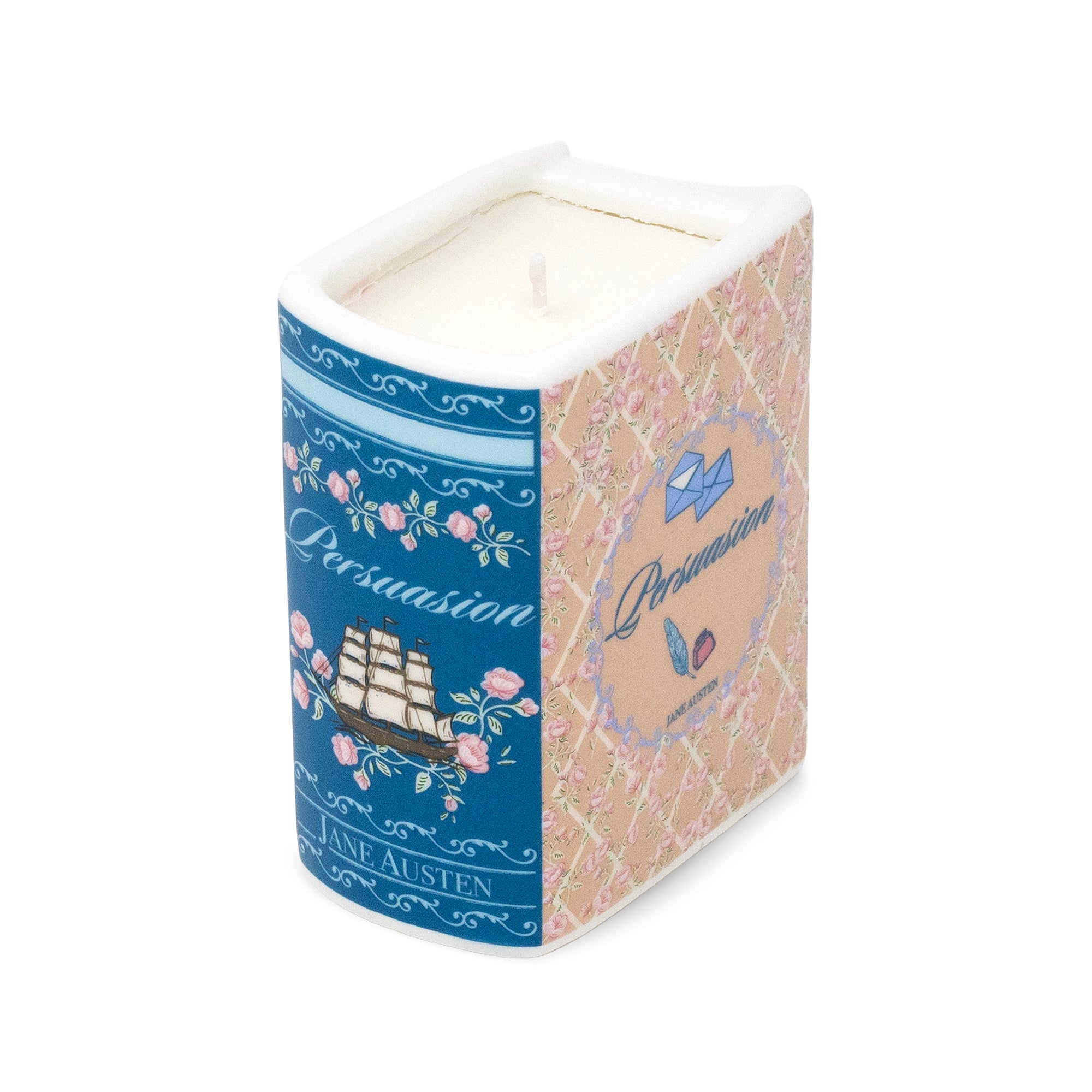 A square-shaped ceramic candle in a decorative box with a blue floral panel and a pink lattice patterned side, featuring the text 'Persuasion' and 'Jane Austen'.