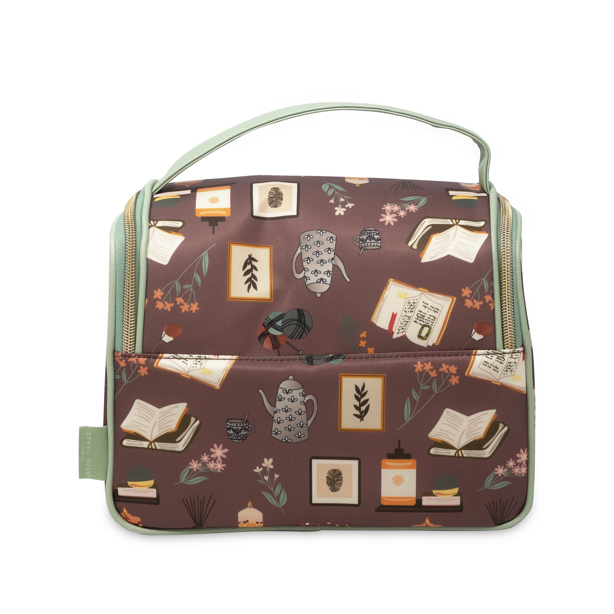 Patterned bag with books and teacups on a brown background