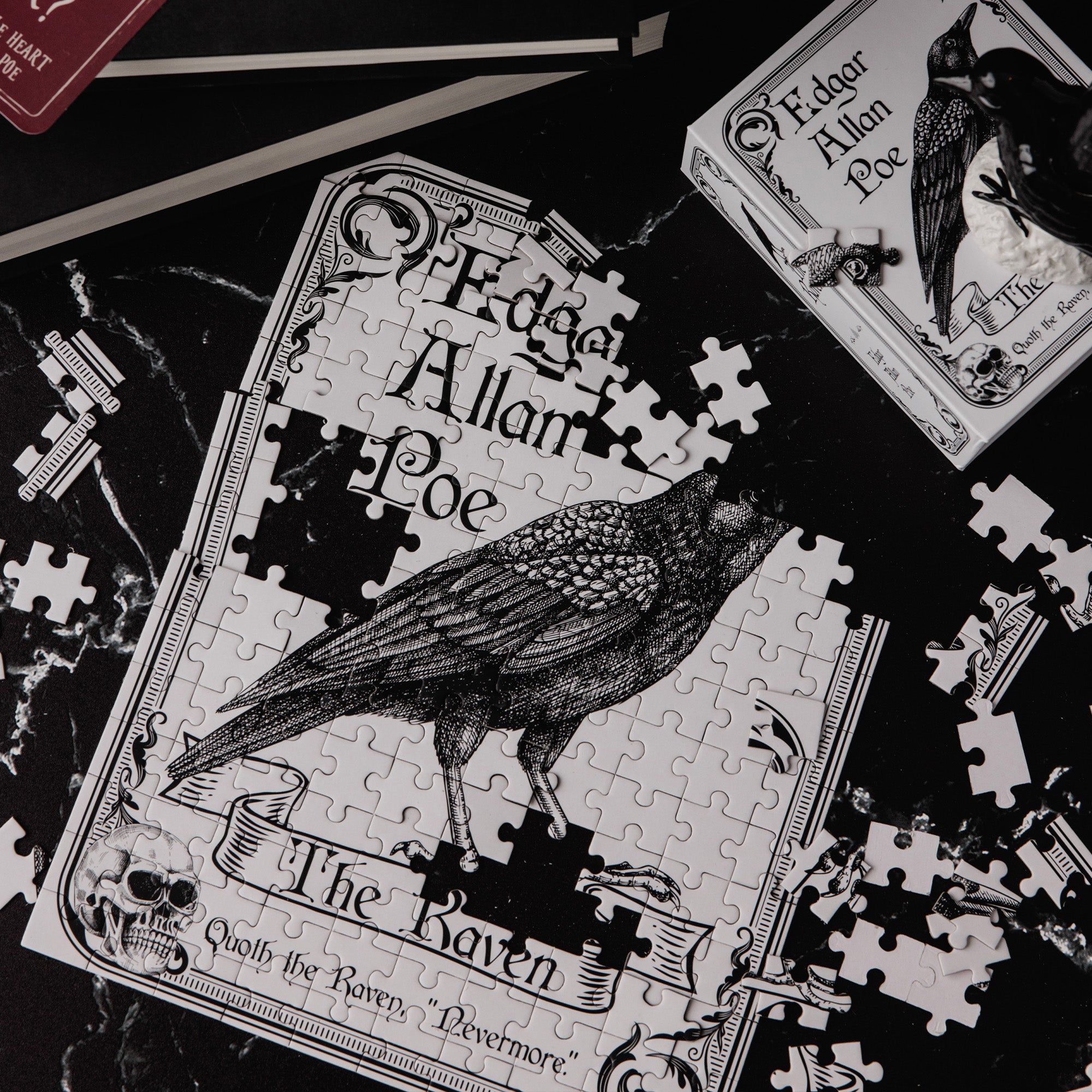 Playing puzzle with 'The Raven' design featuring a crow and text on a white background