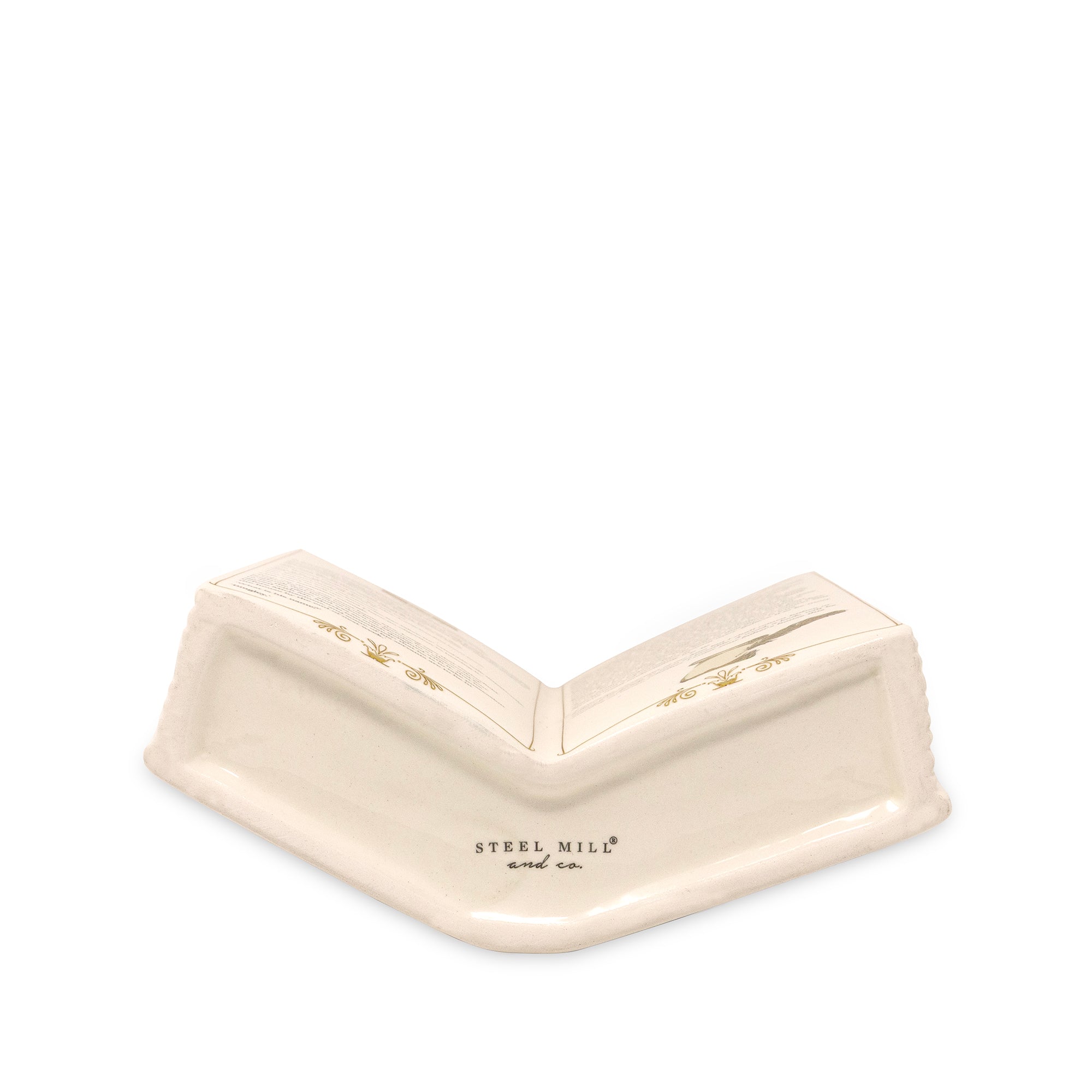 An off-white ceramic vase with gold leaf patterns on the inner surfaces and 'STEEL MILL' printed in black near the base, shown on a solid white background.