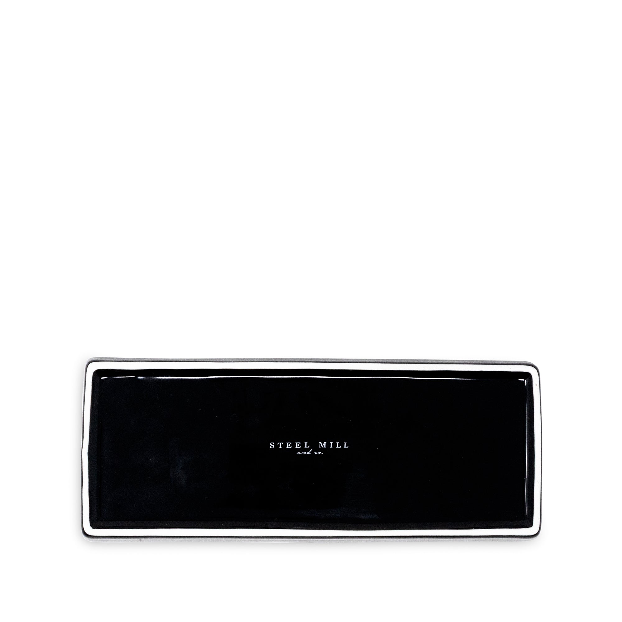 back view of A white rectangular tray featuring a black ornate border, a raven illustration, and the text 'The Raven' and 'Edgar Allan Poe' printed in black.