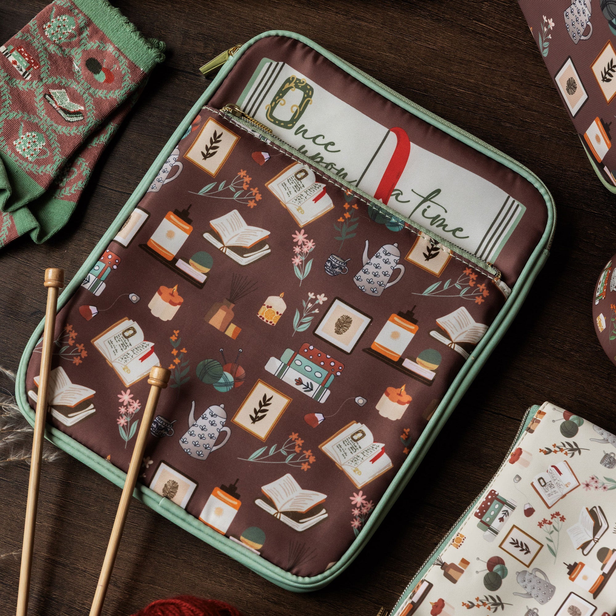 brown book sleeve with colorful cozy book nook icons