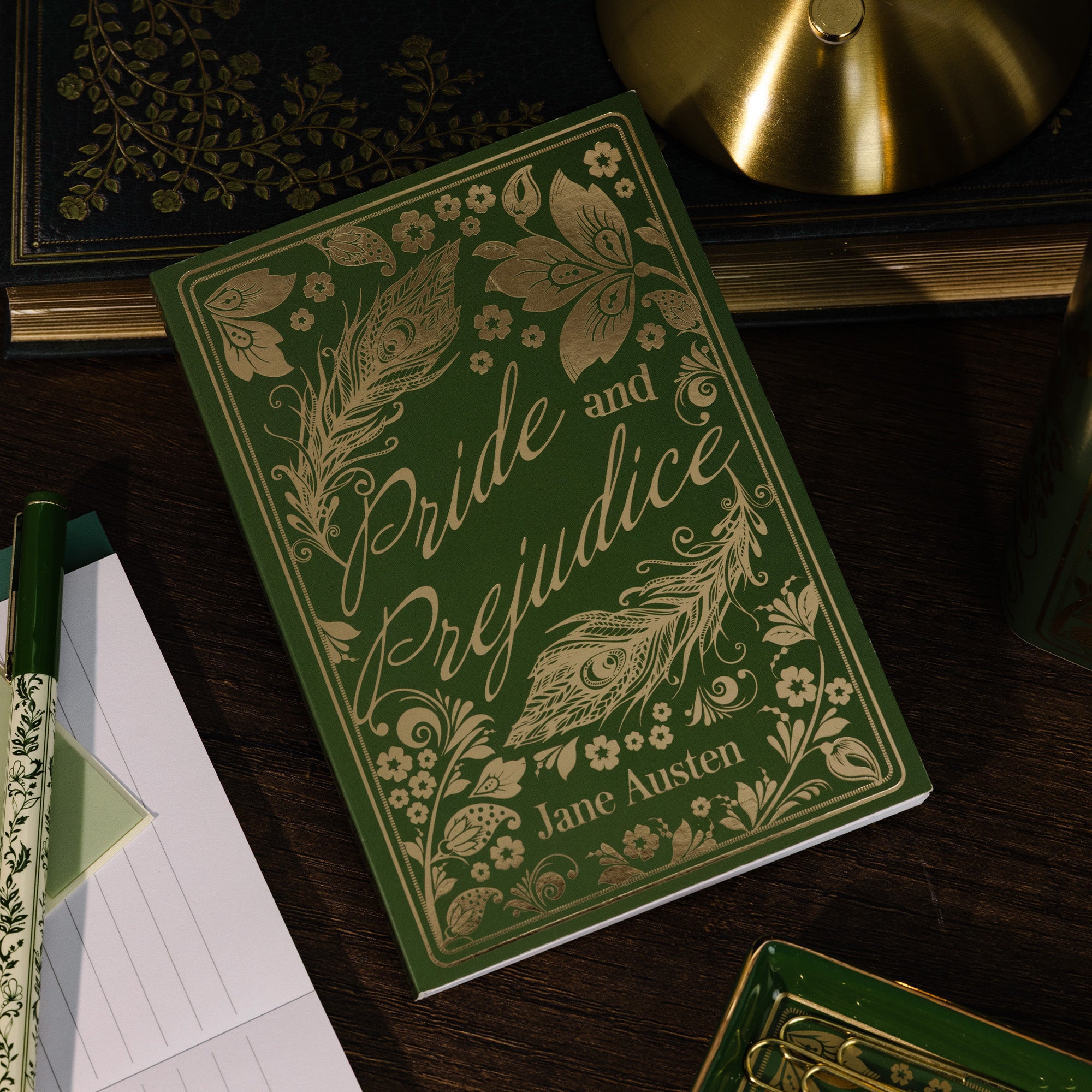 Decorative book-shaped container with 'Pride and Prejudice' design on a white background