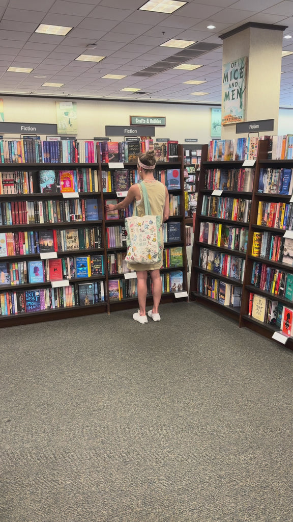 showcasing wearing tote while shopping