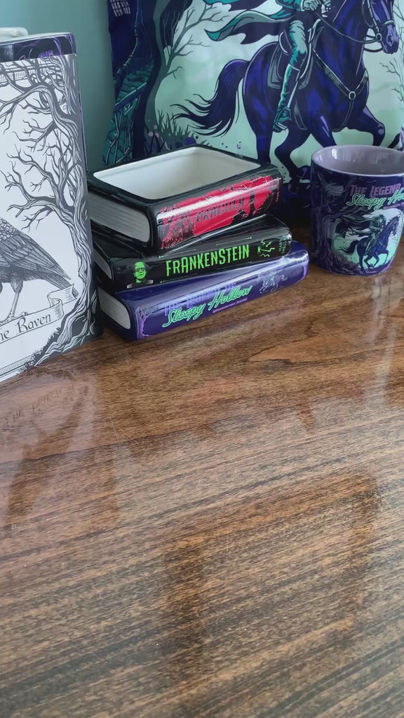model showcasing pens in different colors (purple, cream, lime green, lavender, and red)