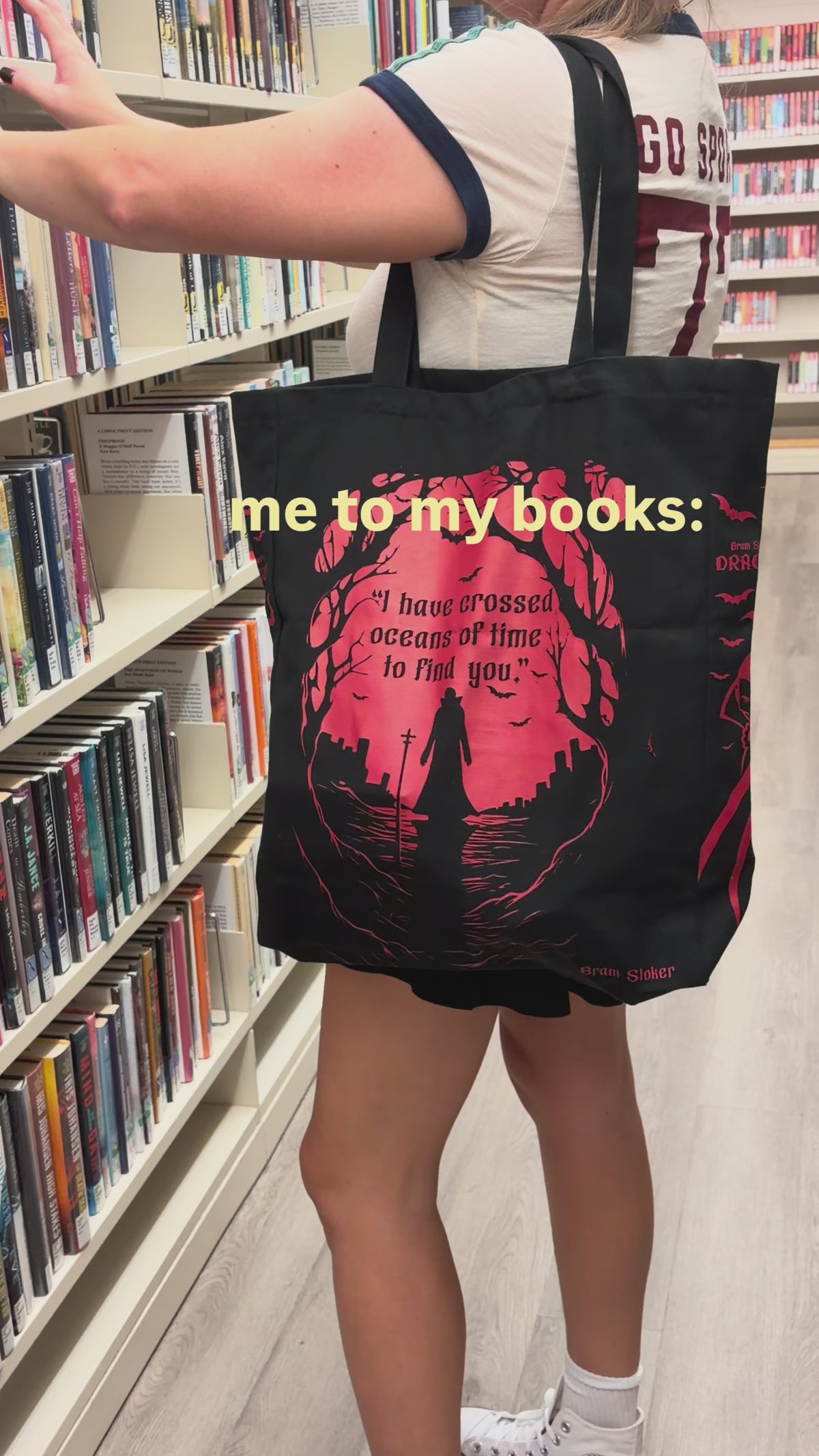 model carrying dracula tote bag