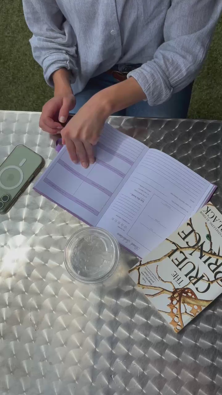 model flipping through book planner
