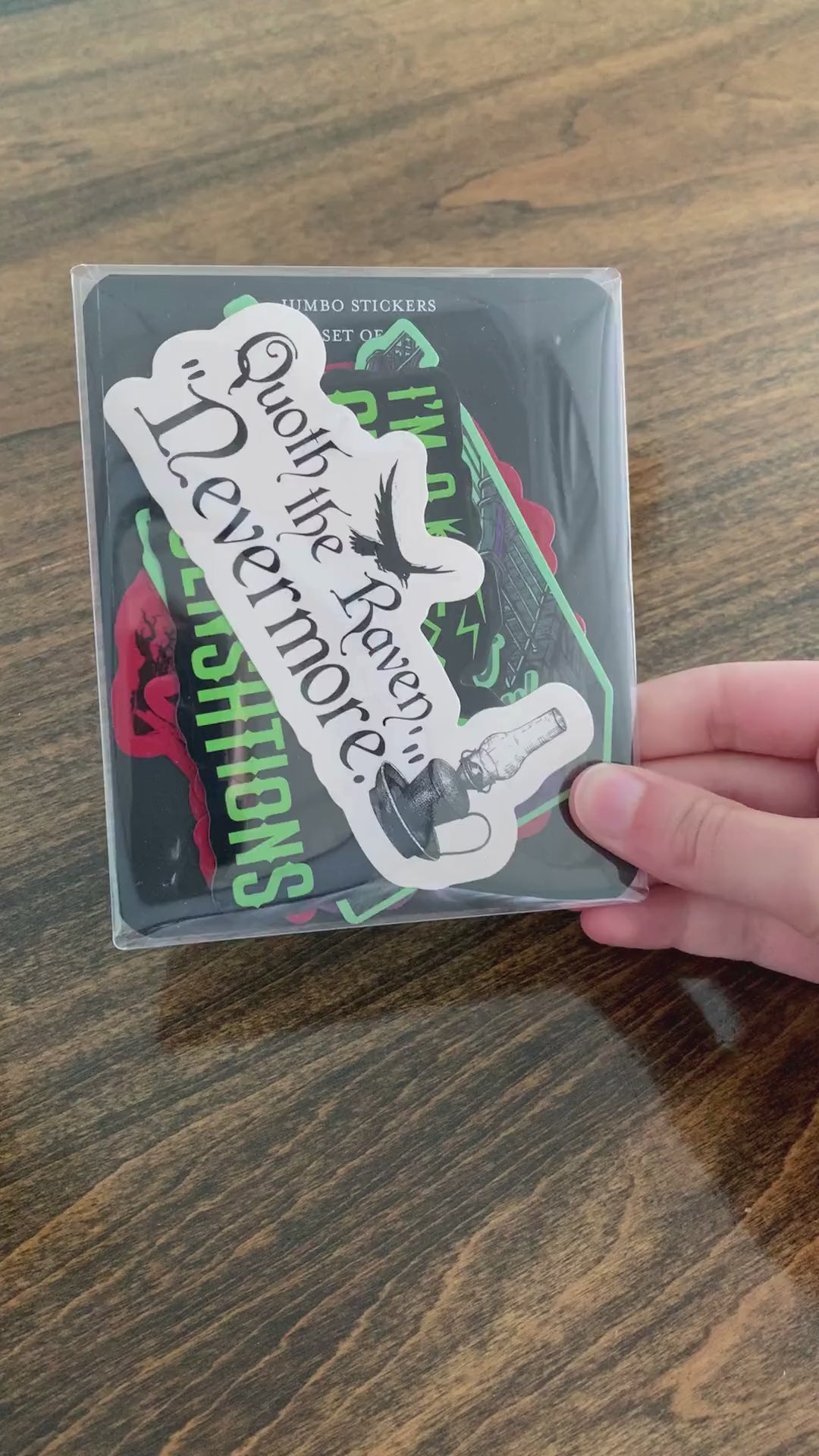 model showcasing set of Halloween-themed stickers with various designs