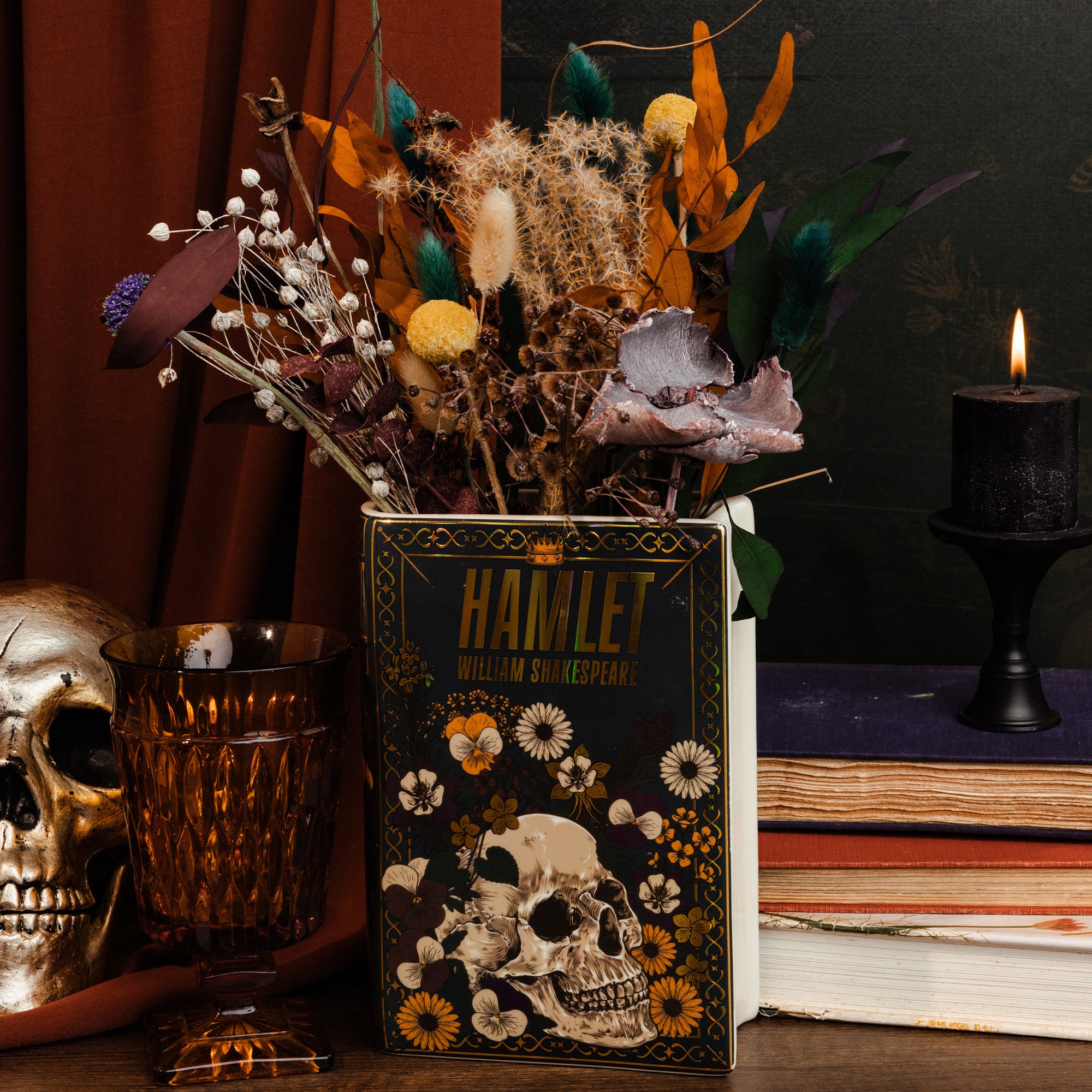 black hamlet book shaped vase with dried flowers inside
